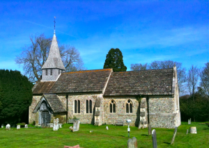 St Peter’s, with the Martyrs Memorial to the right - click for a larger image St Peter's Woodmancote